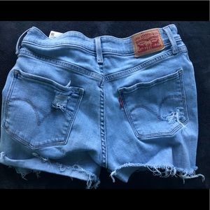 Ripped Levi Jean Shorts. Size: 6. Price negotiable.